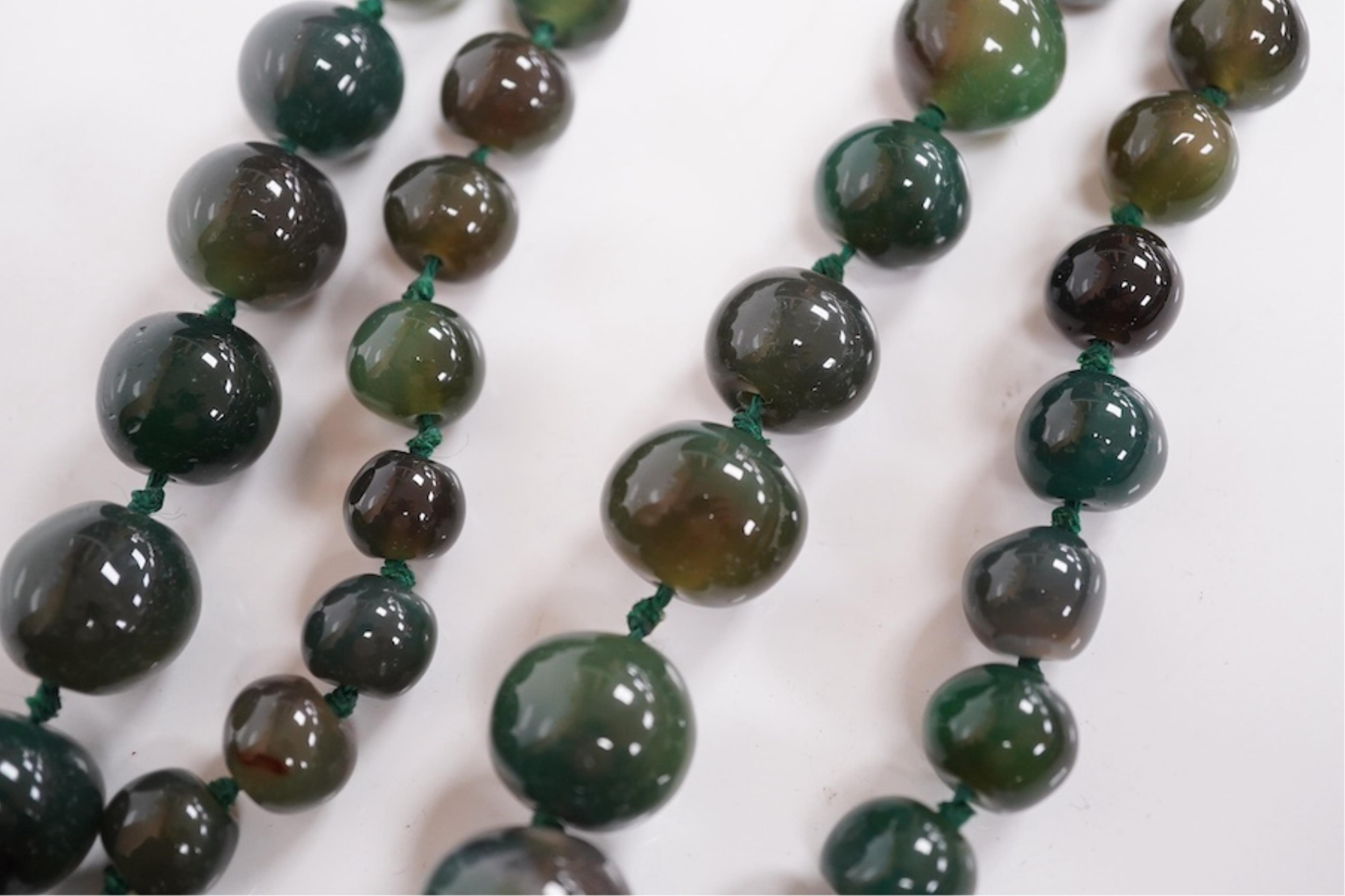 An early 20th century hardstone beaded necklace. Condition - fair